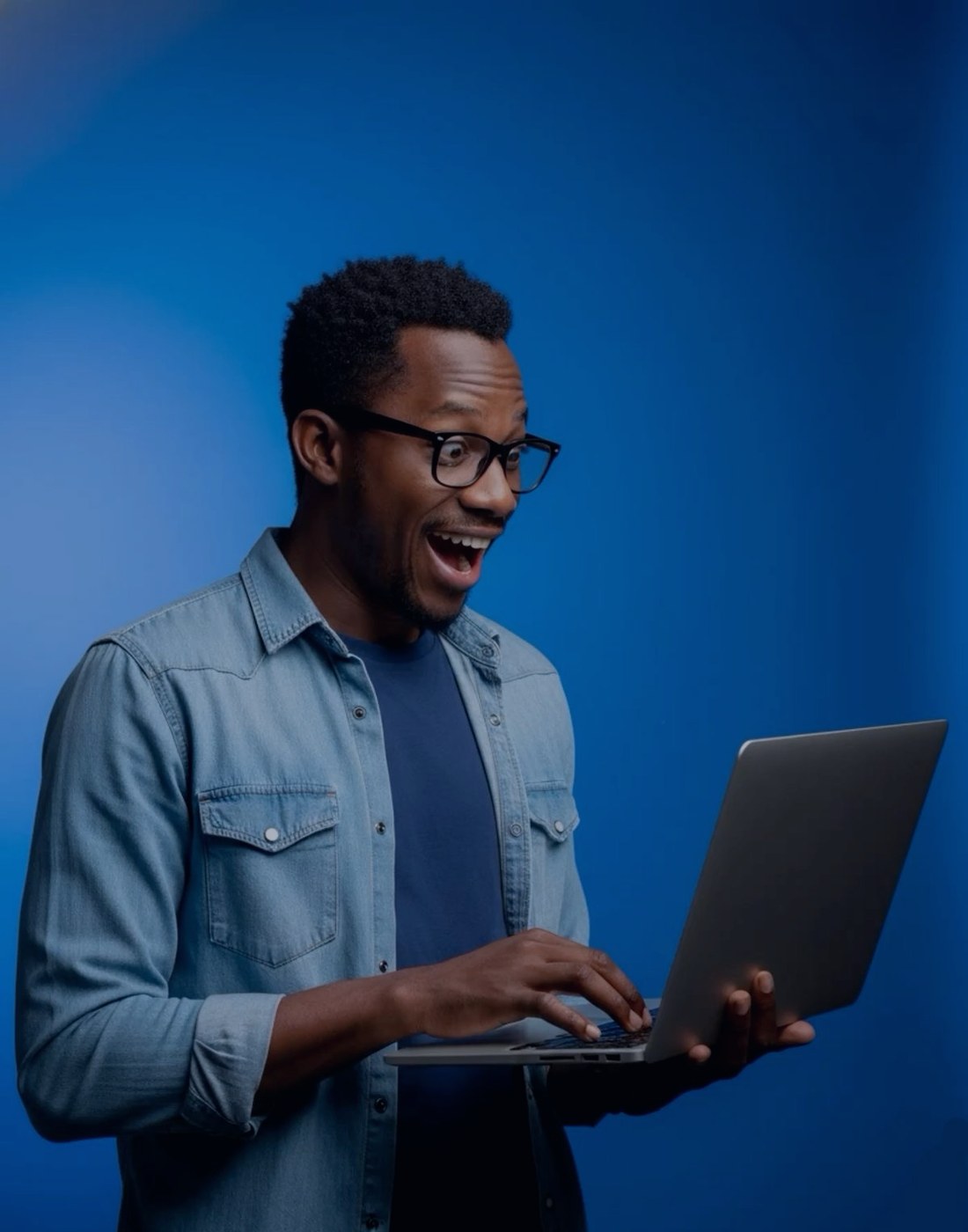 A contributor working on a laptop